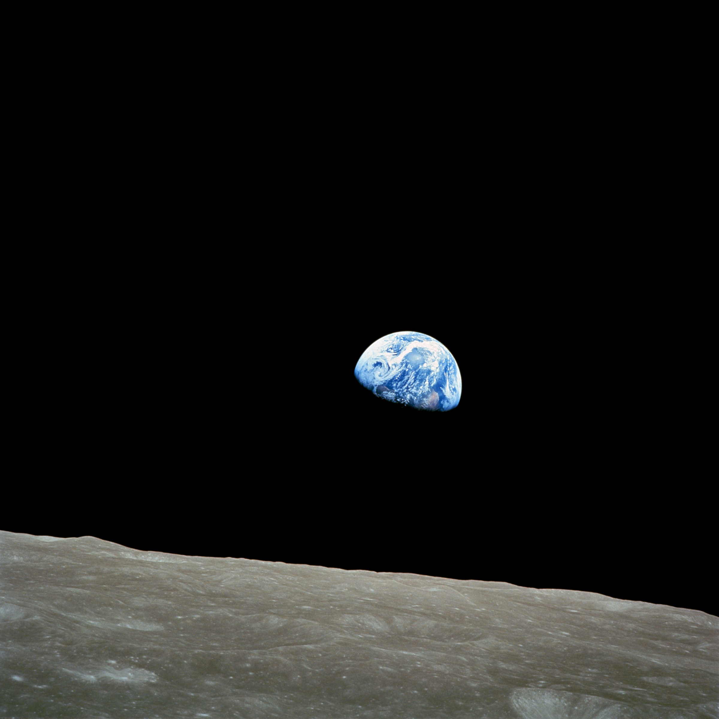 The original Earthrise photograph, taken by Apollo 8 astronaut Bill Anders on December 24, 1968, showing Earth appearing over the Moon's horizon
