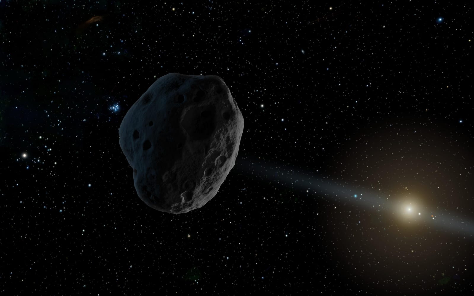 Artist's concept of a near-Earth asteroid with an elongated orbit, shown as a dark rocky body against black space. NASA/JPL-Caltech image PIA21259.