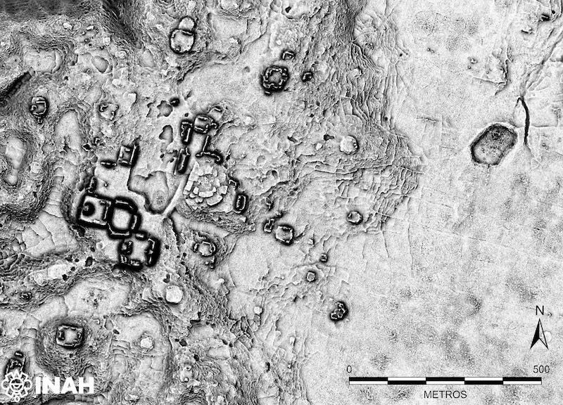 Black and white LiDAR scan showing the terrain of the Minanbé site, with the rectangular footprints of buildings and plazas visible beneath the forest canopy.